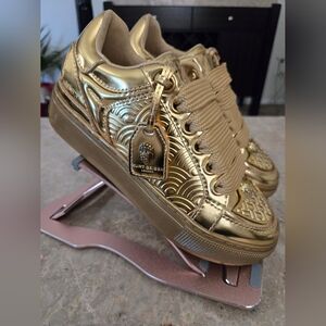 Kurt Geiger London Southbank Tag Platform Sneakers in metallic gold.  Size 38.5